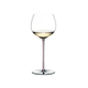 RIEDEL Fatto A Mano Oaked Chardonnay Pink R.Q. filled with a drink on a white background