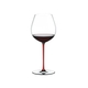 RIEDEL Fatto A Mano Pinot Noir Red R.Q. filled with a drink on a white background