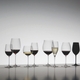 An unfilled RIEDEL Sommeliers Mature Bordeaux/Chablis/Chardonnay glass on white background with product dimensions