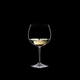 RIEDEL Restaurant Oaked Chardonnay filled with a drink on a black background