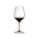 A RIEDEL Fatto A Mano Performance Pinot Noir glass with red stem filled with red wine.