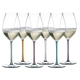 6 champagne filled RIEDEL Fatto A Mano Champagne Wine Glasses with stems which are colored in mint, orange, mauve, white, turquoise and violet stand slightly offset side by side.