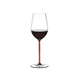 RIEDEL Fatto A Mano Riesling/Zinfandel Red R.Q. filled with a drink on a white background