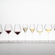 An unfilled RIEDEL Veloce Pinot Noir glass on a white background with product dimensions.