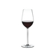 RIEDEL Fatto A Mano Riesling/Zinfandel White R.Q. filled with a drink on a white background