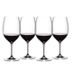 4 RIEDEL Vinum Cabernet Sauvignon/Merlot glasses filled with red wine stand slightly offset side by side