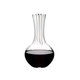 RIEDEL Decanter Performance filled with a drink on a white background