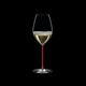 RIEDEL Fatto A Mano Champagne Wine Glass Red R.Q. filled with a drink on a black background