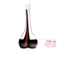 An unfilled RIEDEL Black Tie Smile Decanter Red with a black/red/black stripe on a white background next to a schematic wine glass icon which shows the height of the decanter and the wine glass in relation.