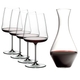 4 RIEDEL Winewings Cabernet Sauvignon glasses and 1 Cabernet Magnum Decanter filled with red wine