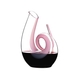 A RIEDEL Decanter Curly Pink filled with red wine.