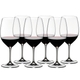 6 red wine filled RIEDEL Vinum Cabernet Sauvignon/Merlot (Bordeaux) glasses stand slightly offset side by side