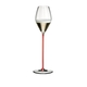 RIEDEL High Performance Champagne Glass Red filled with a drink on a white background
