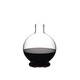 RIEDEL Decanter Marne filled with a drink on a white background
