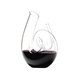 RIEDEL Decanter Curly R.Q. filled with a drink on a white background