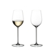 Two RIEDEL Superleggero Viognier/Chardonnay wine glasses. The one on the left side is filled with white wine, the other one is empty.