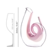 A RIEDEL Decanter Curly Pink filled with red wine on white background. A red line indicates the level of 750ml of wine.