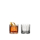 Two RIEDEL Drink Specific Glassware Rocks glasses one filled with a drink and one unfilled on a white background.