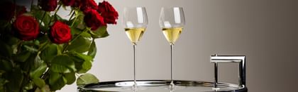 RIEDEL white wine glassware near roses