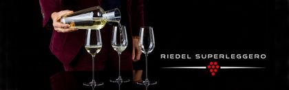 Three RIEDEL Superleggero Champagne Wine Glasses filled with Champagne and the RIEDEL Superleggero Logo