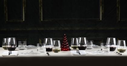 stemless wine glasses on table setting