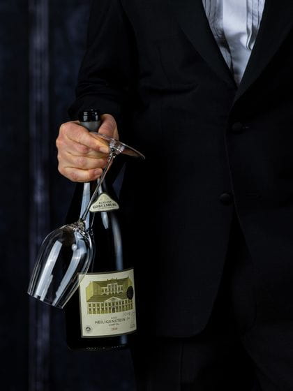 RIEDEL Superleggero wine glass with a wine bottle