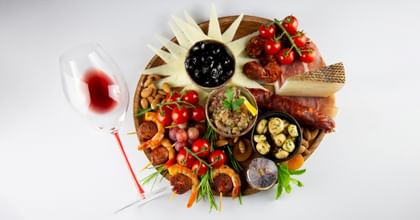 vegetable tray and wine glass from above