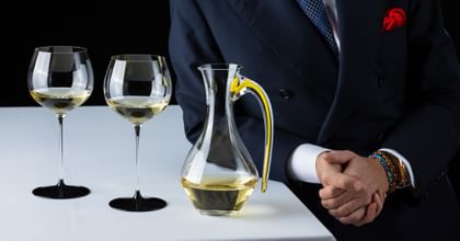 RIEDEL Fatto a Mano Black Tie glasses next to RIEDEL Fatto a Mano Cabernet Decanter