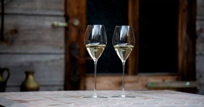 RIEDEL Performance Sauvignon Blanc filled with white wine.