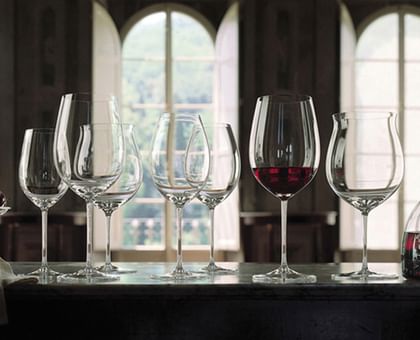 RIEDEL Sommeliers Series unfilled with a windowsill in the background.