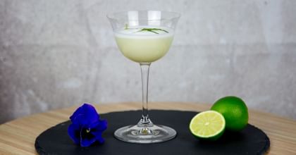 RIEDEL Drink Specific Glassware Sour Glass with a lime cocktail in it
