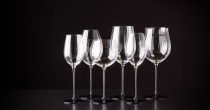 various RIEDEl glasses lined up