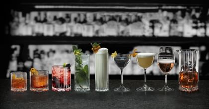 various barware glasses lined up