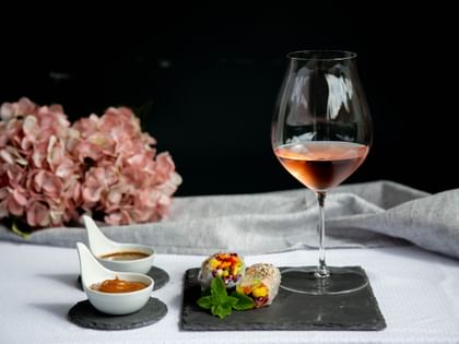 Rosé and food on table
