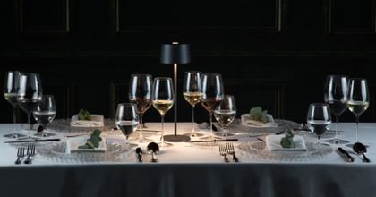 table setting with wine glasses