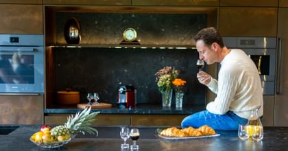 Maximilian J. Riedel smelling coffee