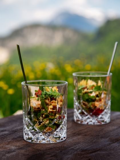 cocktail glasses in picnic setting