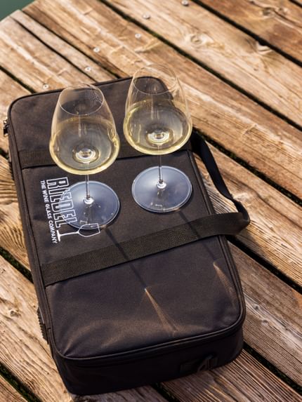 two white wine glasses outside