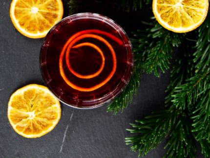 shot from above, cocktail next to oranges