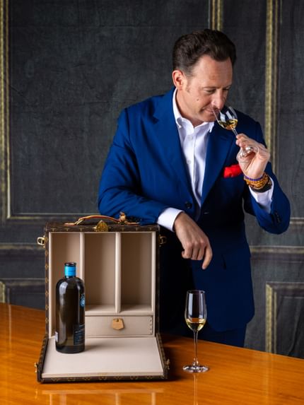 man enjoying wine aroma