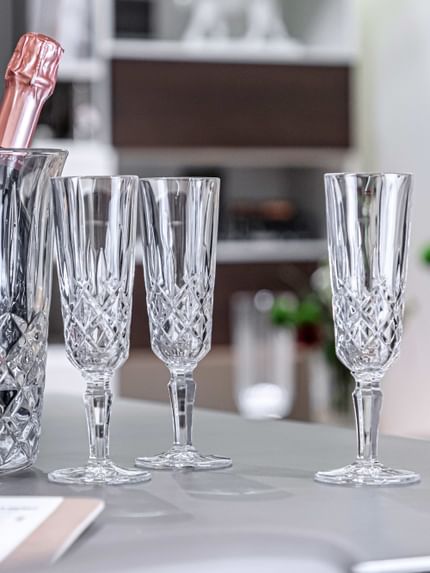 Three NACHTMANN Noblesse champagne glasses on a table