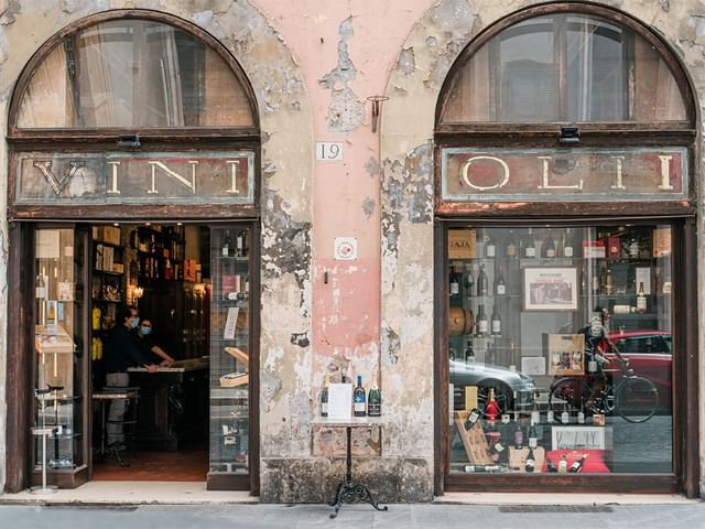 Lifestyle image of the outside of a bottle shop.