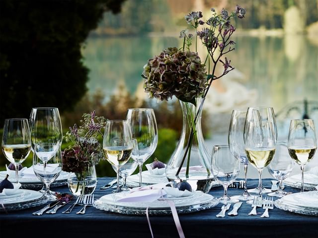 various wine glasses on set table outdoors