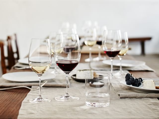 wine glasses on table setting