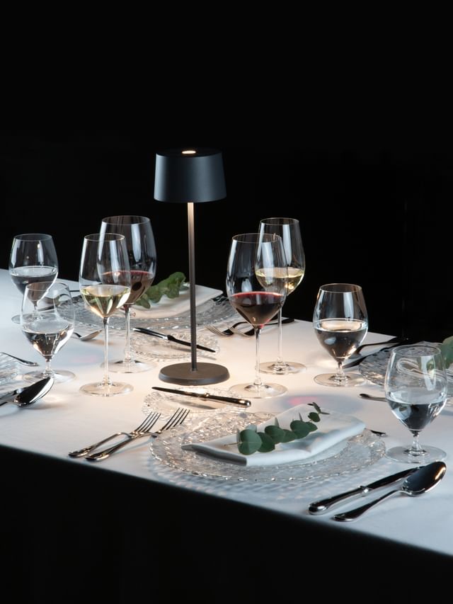 table setting with wine glasses