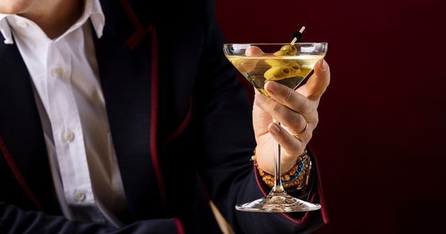 hand holding RIEDEL Extreme Martini glass
